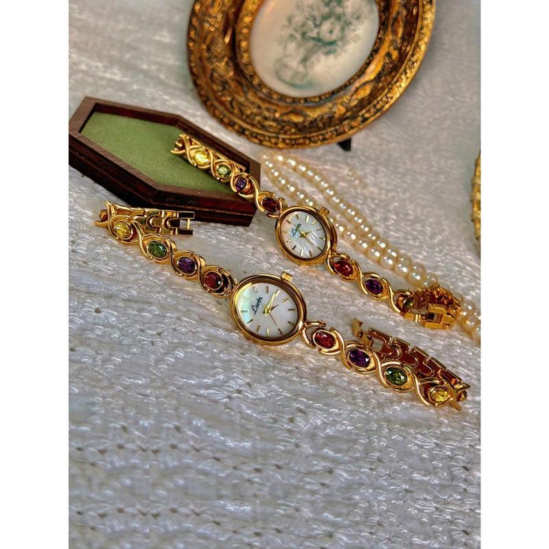 1pc New High-End Luxury Women's Watch Embedded With Colorful Tourmalines, Diamonds And An Oval Shaped Mother Of Pearl Dial. It Can Be Worn On A Daily Basis, Or For Occasions Such As Parties, Holidays And Outings To Decorate The Wrist
