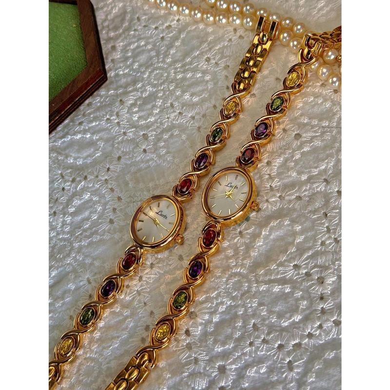 1pc New High-End Luxury Women's Watch Embedded With Colorful Tourmalines, Diamonds And An Oval Shaped Mother Of Pearl Dial. It Can Be Worn On A Daily Basis, Or For Occasions Such As Parties, Holidays And Outings To Decorate The Wrist